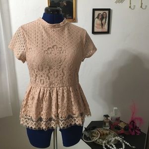 Nude pink lace peplum mock neck top